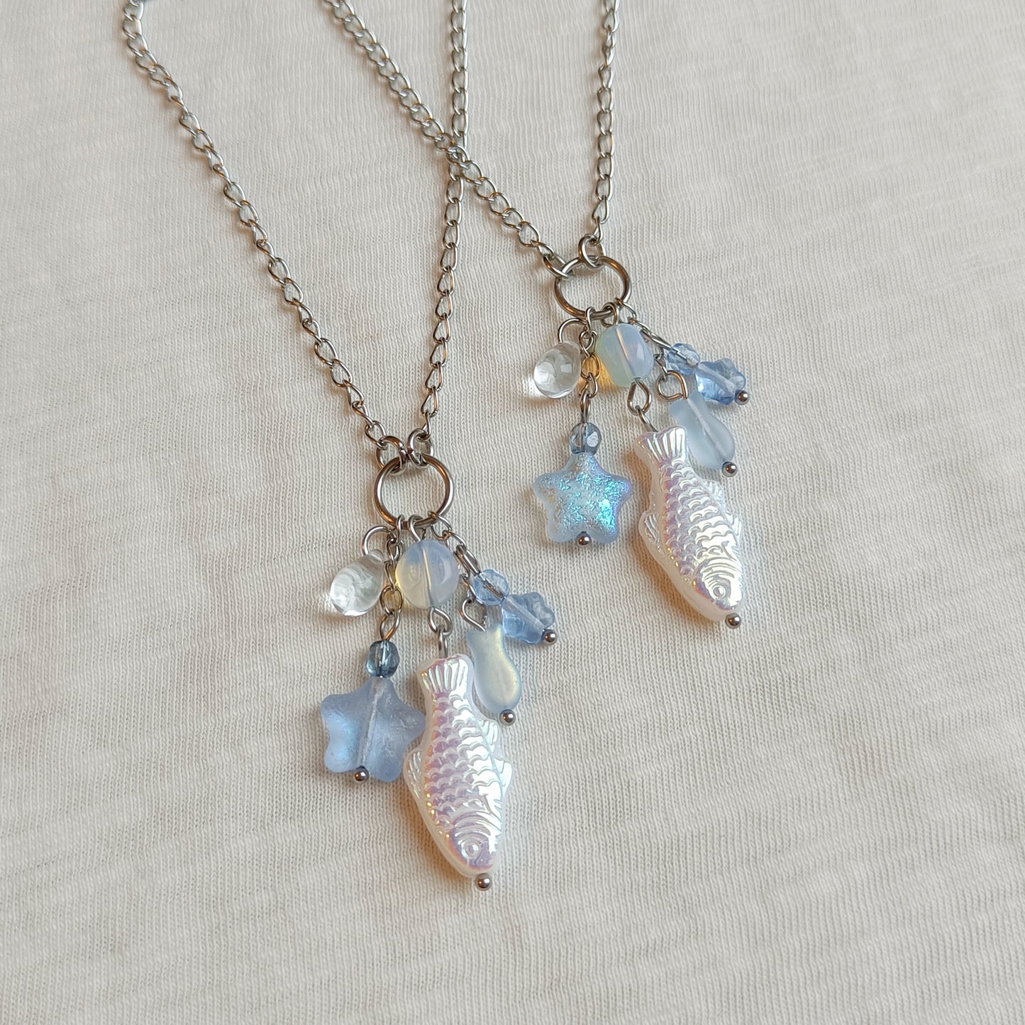 BLUE FISH CHARM NECKLACE